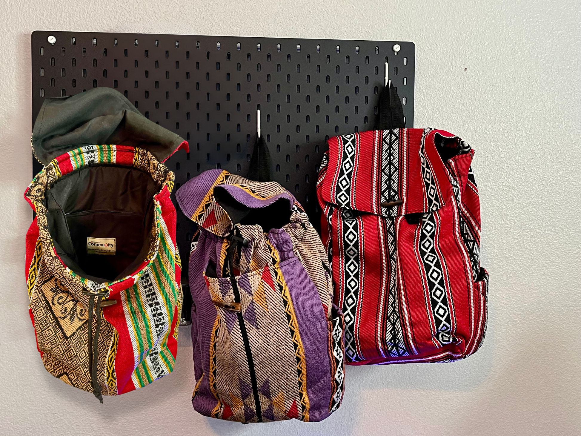 The Artisan's Journey Backpack comes in three styles: The Sands of Time, Desert Night, and Sheesha Red