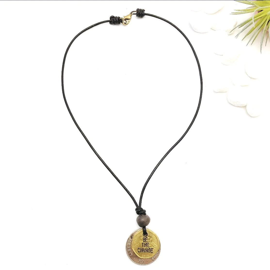 Be The Change Cord Necklace with hand-engraved Haitian Gourde coin and Papillon ceramic bead