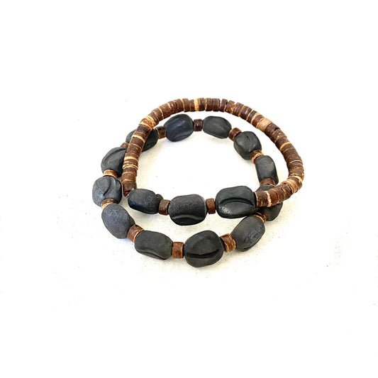 Celebrate your coffee obsession!!  Handmade Haitian clay beads are fired with banana leaves to bring out natural tones and textures and then shaped to look like a coffee bean! Great Jewelry for Men and Women alike!