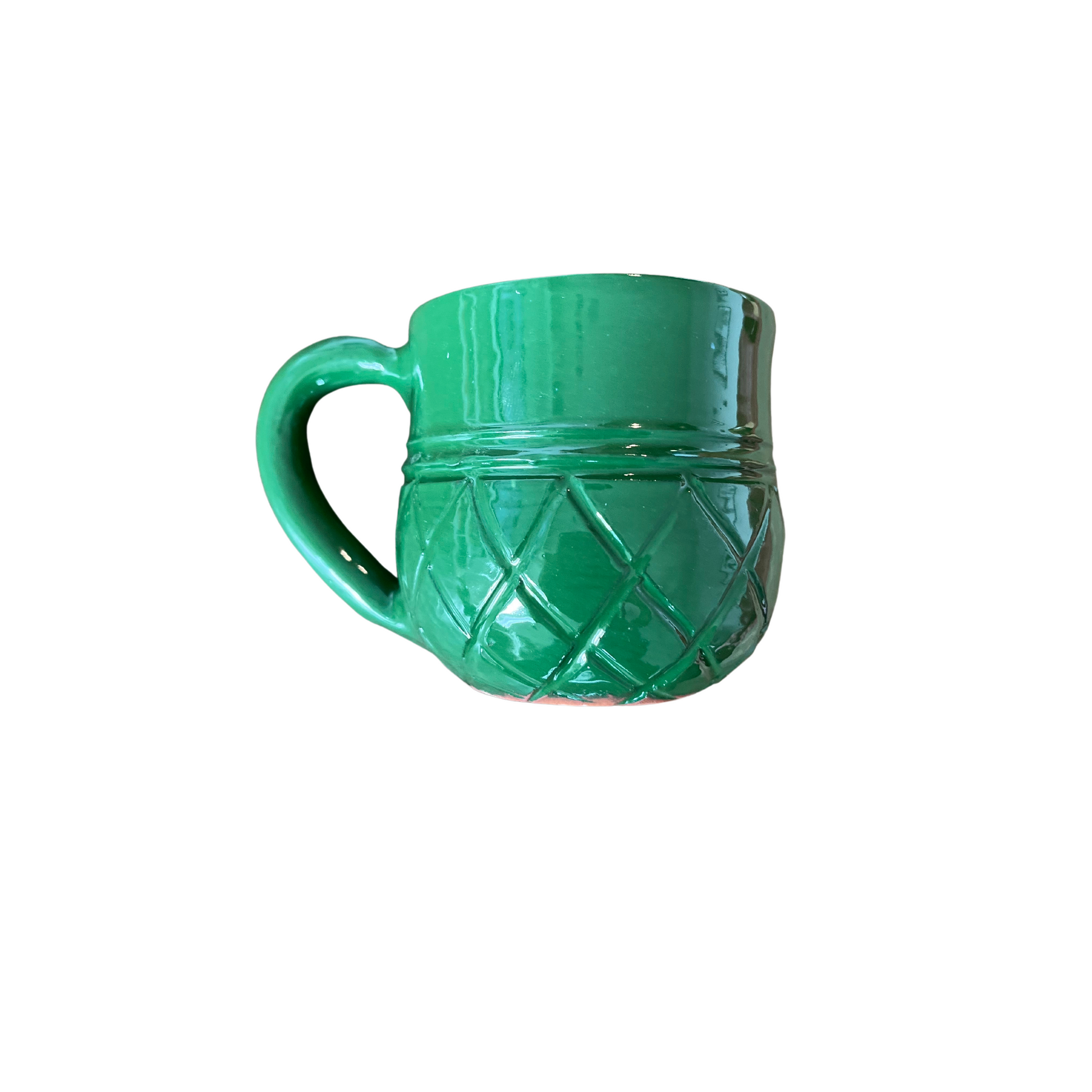 Handcrafted 6 ounce Ananas Mug in Green. It has a checkered pattern scored into the lower half making each much unique.