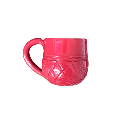 Handcrafted 6 ounce Ananas Mug in Red. It has a checkered pattern scored into the lower half making each much unique.