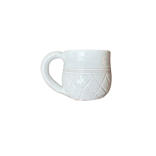 Handcrafted 6 ounce Ananas Mug in White.  It has a checkered pattern scored into the lower half making each much unique. 