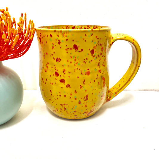 Yellow/Red speckled handcrafted mug.  Natural Clay mug with handle. 16oz capacity. 